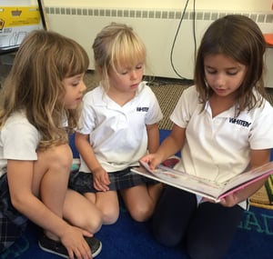 Amaara reading to Amelia and Matilda-968713-edited