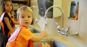 Stepping stones student washing hands