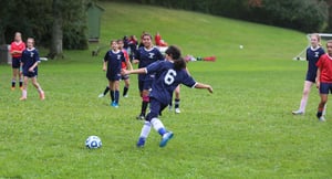 Soccer match on Whitby's athletics field